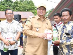 Marco Simbolon Dampingi Bupati Samosir Dalam Bunga Desa